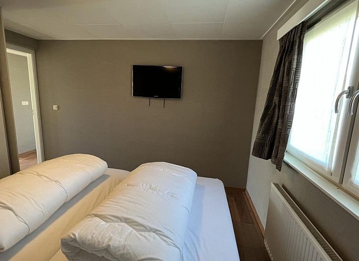 Essbereich auf der Terrasse von VZ807 Ferienhaus Breskens, ideal fuer Mahlzeiten im Freien in Zeeland.