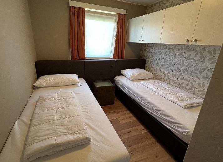 Essbereich auf der Terrasse von VZ807 Ferienhaus Breskens, ideal fuer Mahlzeiten im Freien in Zeeland.