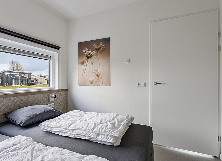 Vrijstaande woning in Breskens, Zeeuws-Vlaanderen, met groene omgeving en moderne architectuur, ideaal voor een ontspannen vakantie in Zeeland.