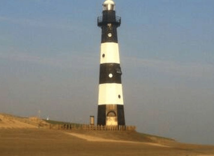 Cozy living room in Cottage in Breskens, vacation home in Zeeuws-Vlaanderen, Zeeland with comfortable sofas.