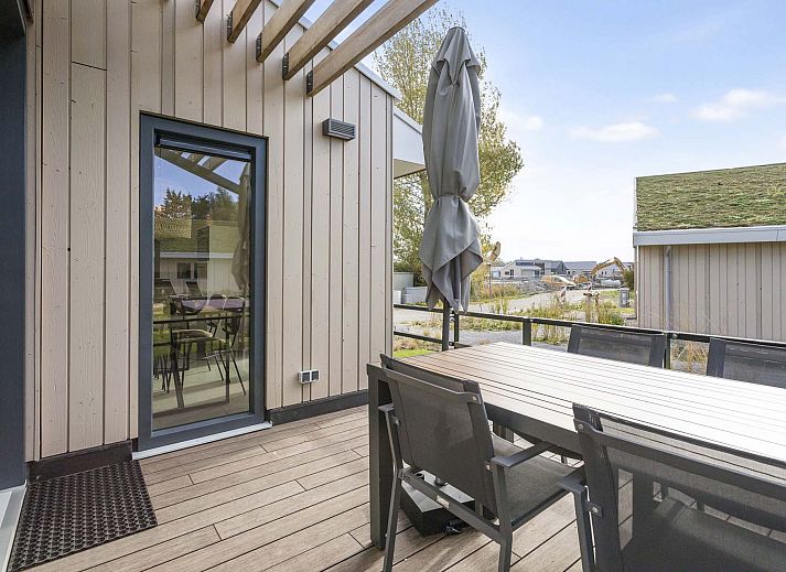 Ansicht des Einfamilienhauses in Breskens, Ferienhaus in Zeeland mit moderner Architektur und grner Umgebung.