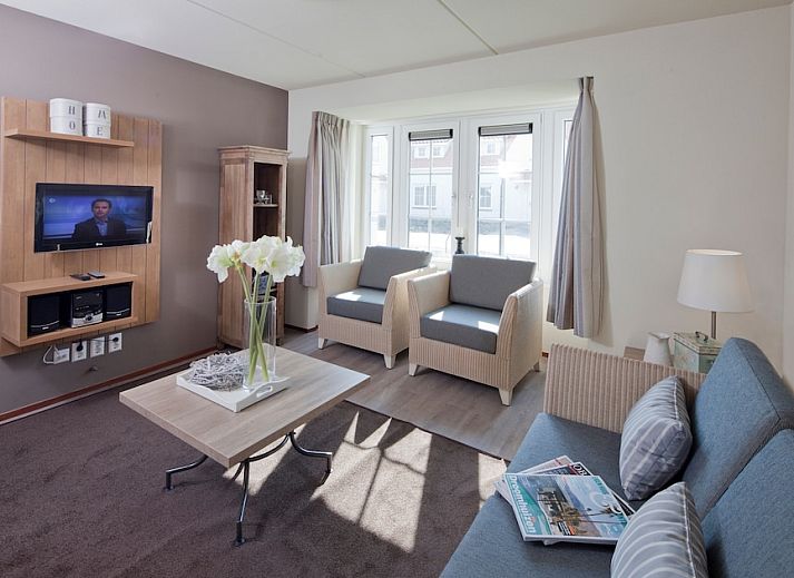 Villa 4C in Cadzand-bad, ein charmantes Ferienhaus in Zeeuws-Vlaanderen mit einem sonnigen Garten und traditioneller Architektur.