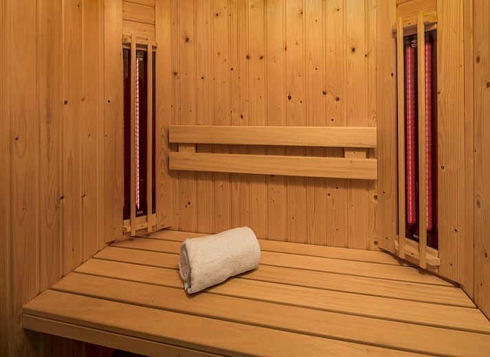 Gezellige woonkamer van Villa 8G Luxe in Cadzand-bad, Zeeuws-Vlaanderen. Comfortabel vakantiehuis met moderne inrichting in Zeeland.