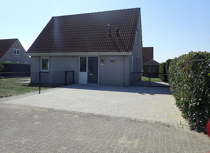 Cozy living room of VZ921 Holiday home in Cadzand-Bad overlooking the garden, Zeeland.