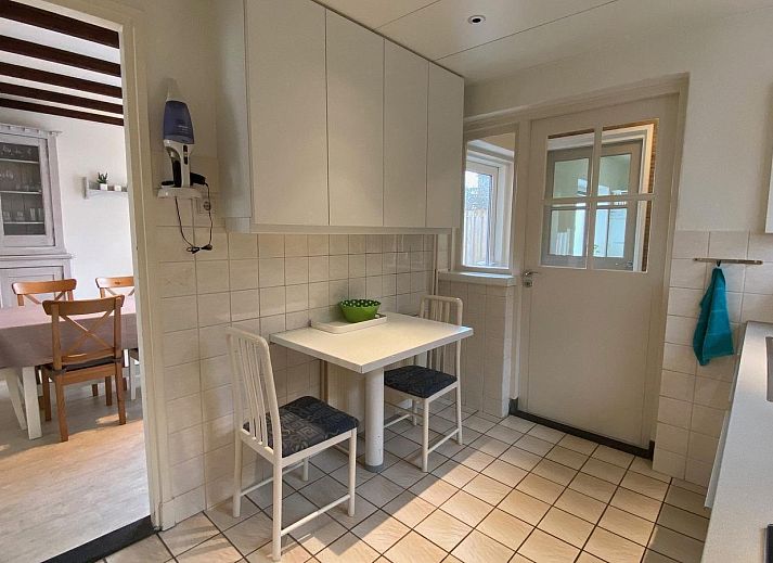 Terrace of VZ920 Holiday home in Cadzand-Bad, Zeeuws-Vlaanderen, ideal for outdoor meals.