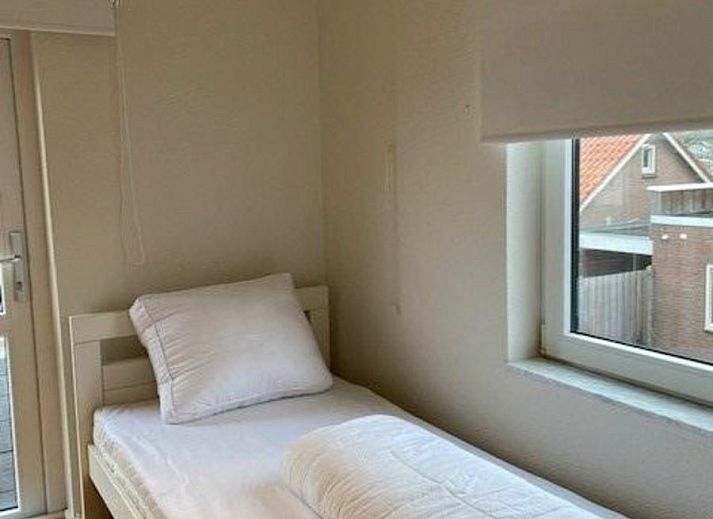 Overdekte veranda bij VZ1094 Vrijstaande vakantiewoning in Cadzand-Bad, Zeeuws-Vlaanderen voor gezellige avonden.