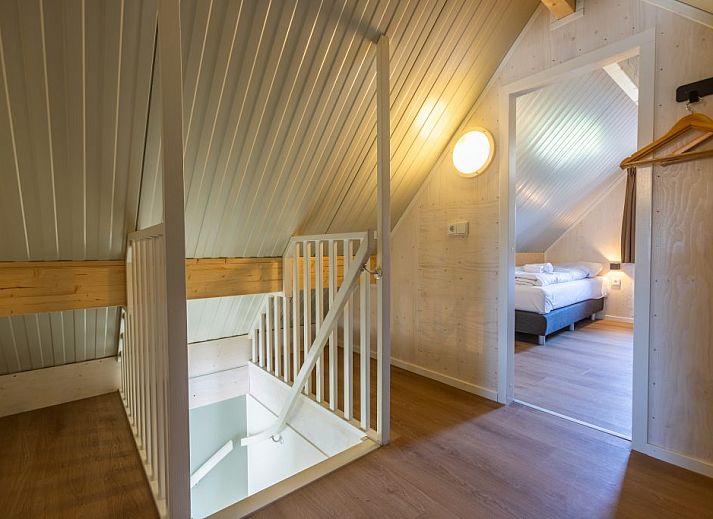 Stijlvolle woonkamer in de Vrijstaande woning in Cadzand, Zeeuws-Vlaanderen, met moderne inrichting en comfortabele zitruimte.