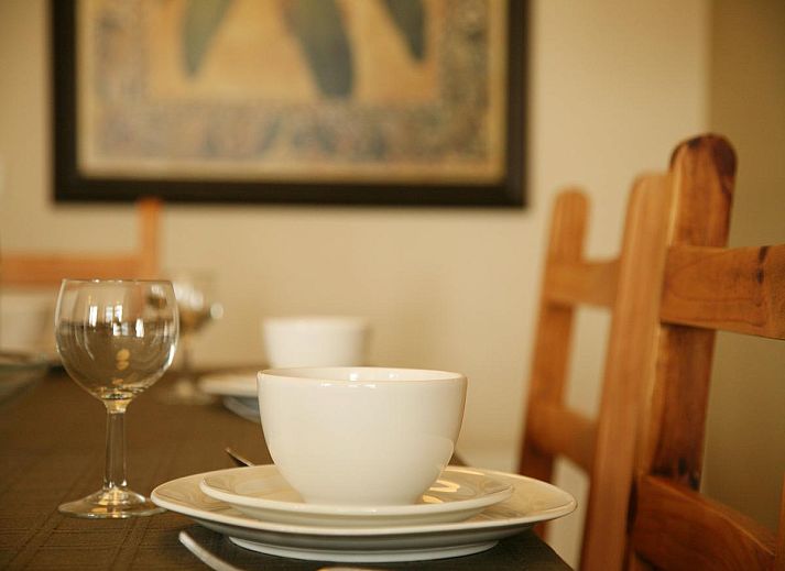 Buitenzijde van vakantiehuis Maanvis in Cadzand, Zeeuws-Vlaanderen met een ruime tuin.