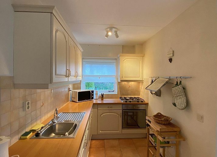 VZ333 Vakantiehuis Cadzand, charmant terras met plantenbakken, vakantiehuis in Zeeuws-Vlaanderen, Zeeland.