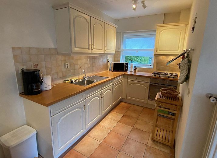 VZ333 Vakantiehuis Cadzand, charmant terras met plantenbakken, vakantiehuis in Zeeuws-Vlaanderen, Zeeland.