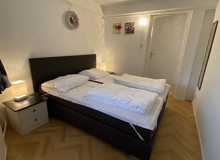 Gezellig terras van VZ420 Vakantieappartement Cadzand in Zeeuws-Vlaanderen, ideaal voor ontspanning.