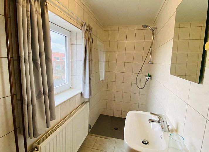 Spacious backyard at VZ628 Holiday home Cadzand, a vacation home in serene Cadzand, Zeeuws-Vlaanderen.