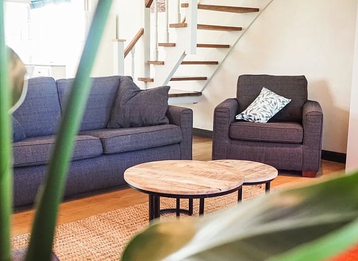 Geniet van de groene tuin en comfortabele zitplek bij Vakantiehuis in Sluis, gelegen in het prachtige Zeeuws-Vlaanderen, Zeeland.