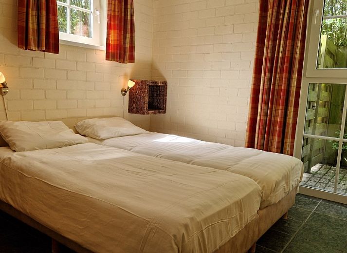 Boerderijverblijf Soncy, een vakantiehuis in Groede, Zeeland, omgeven door weelderige natuur en rustgevende uitzichten.