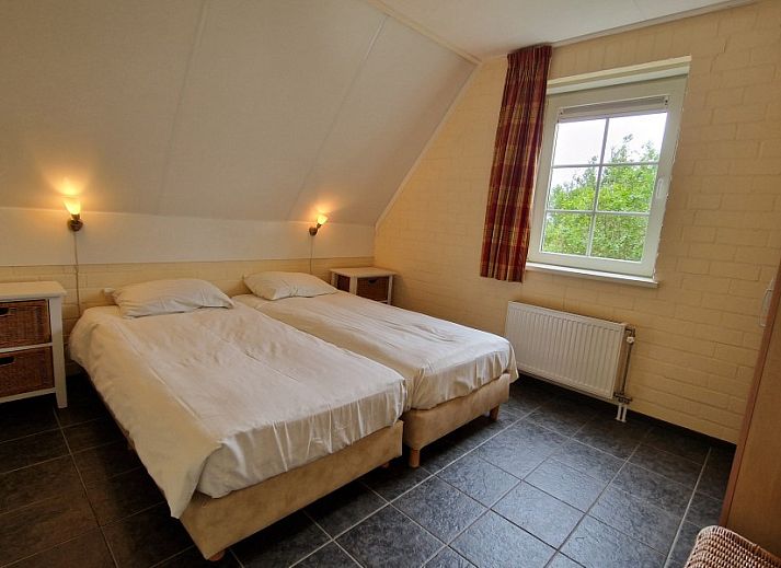 Boerderijverblijf Soncy, een vakantiehuis in Groede, Zeeland, omgeven door weelderige natuur en rustgevende uitzichten.