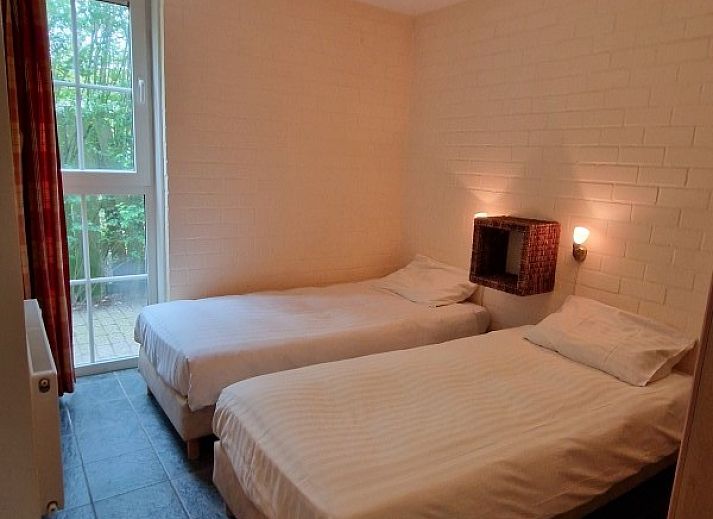 Boerderijverblijf Soncy, een vakantiehuis in Groede, Zeeland, omgeven door weelderige natuur en rustgevende uitzichten.