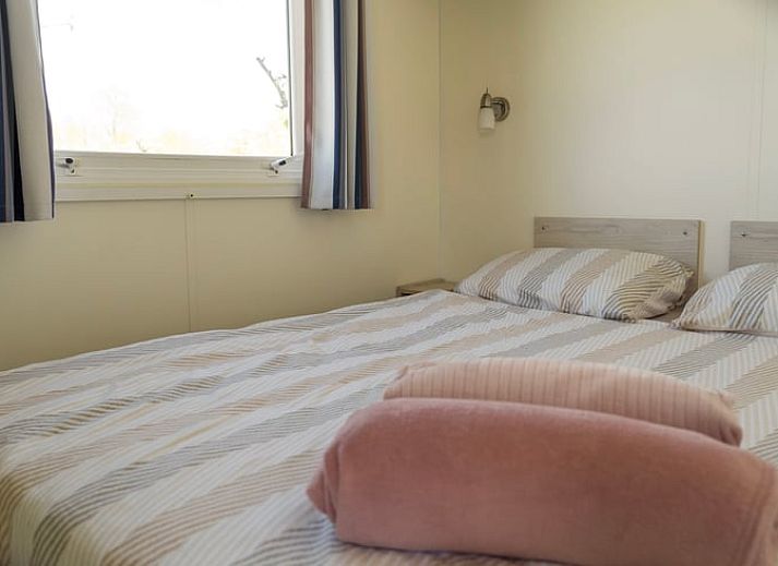 Vakantiehuisje in Hengstdijk, een charmante vakantiewoning in Zeeuws-Vlaanderen met een uitnodigend terras en groene omgeving.