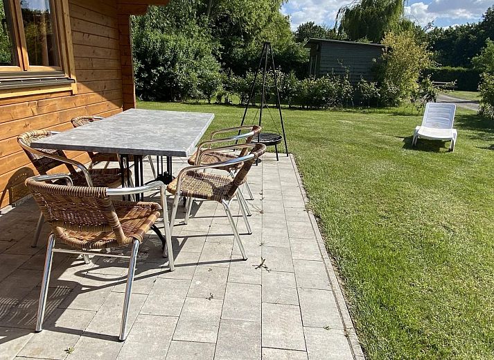 VZ455 Holiday chalet Ossenisse in Zeeuws-Vlaanderen with sunny terrace and wooden exterior.