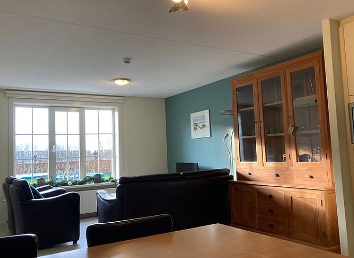 Dining area in Holiday Home in Retranchement, Zeeuws-Vlaanderen, with modern kitchen facilities.