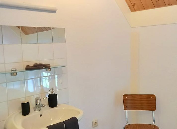 Prachtige regenboog boven Vakantiehuisje in IJzendijke, omgeven door natuur.