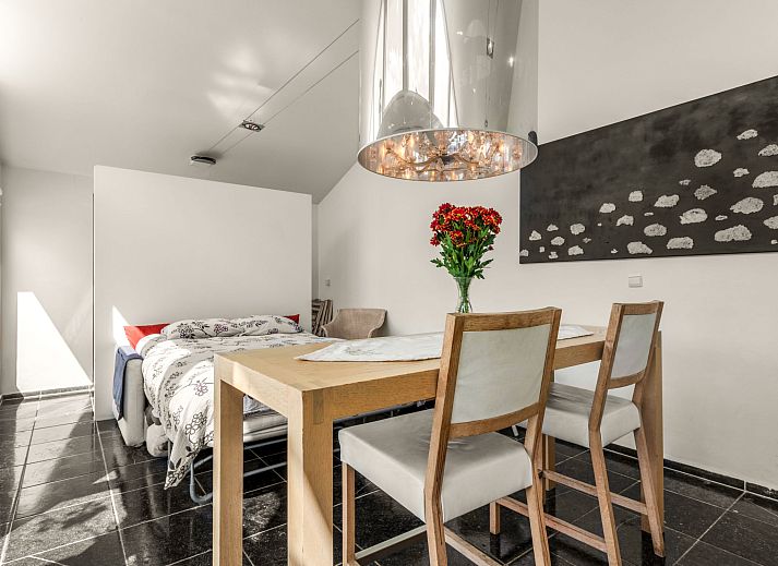 Charming exterior of Holiday Home De Orangerie in Zaamslag, Zeeuws-Vlaanderen, with a cozy patio.