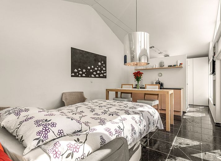 Attractive bedroom with fireplace in Holiday home De Orangerie, Zaamslag, Zeeuws-Vlaanderen, Zeeland.