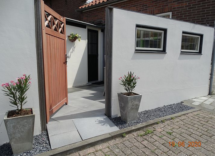 Picturesque view of the mill near vacation home ZE1542 in Biervliet, Zeeland.