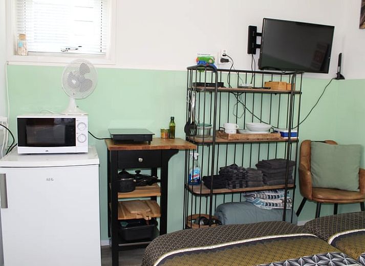 Ferienhaus in Ovezande, Sued-Beveland Ferienhaus mit charmanter Muehle und gruener Umgebung.