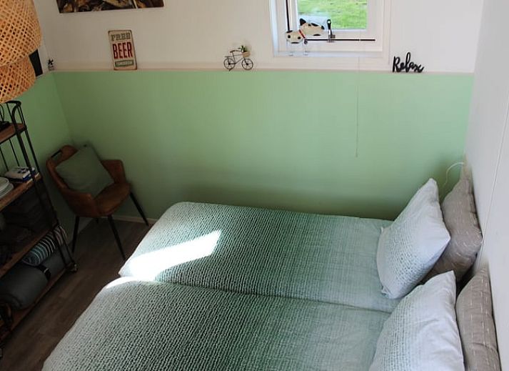 Ferienhaus in Ovezande, Sued-Beveland, mit sonniger Terrasse und Blick aufs Land.