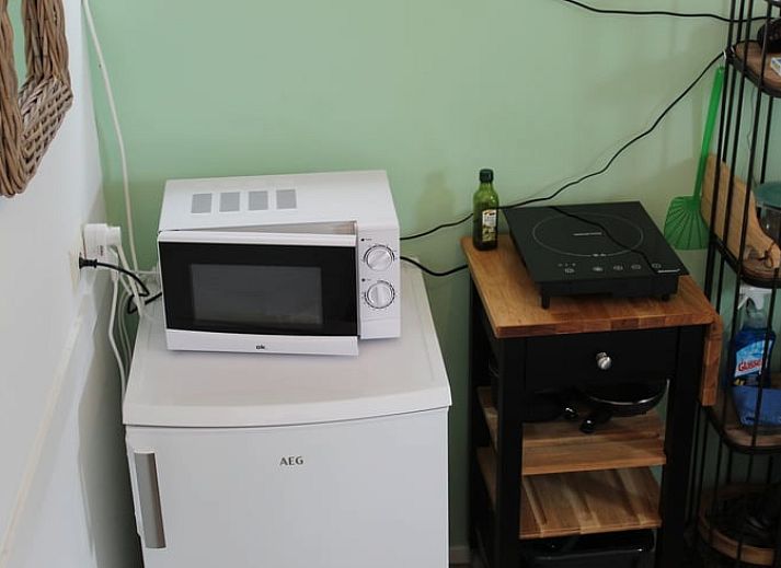 Ferienhaus in Ovezande, Sued-Beveland, mit sonniger Terrasse und Blick aufs Land.
