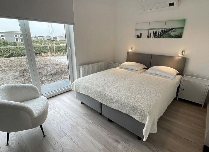 Gemuetliches Wohnzimmer im Ferienhaus Waterresort Oosterschelde Haus Nr. 68, Zuid-Beveland, mit viel Tageslicht.