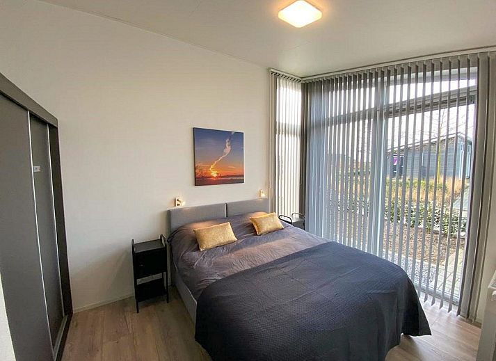 Ferienhaus Waterresort Oosterschelde in Wemeldinge, Zeeland, mit schoenem Blick auf die Natur von der Terrasse aus.