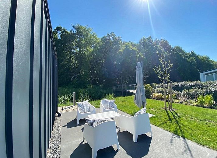 Stilvolles Esszimmer im Ferienhaus Waterresort Oosterschelde, Hausnummer 97, in Wemeldinge, ideal fuer gemuetliche Abendessen.