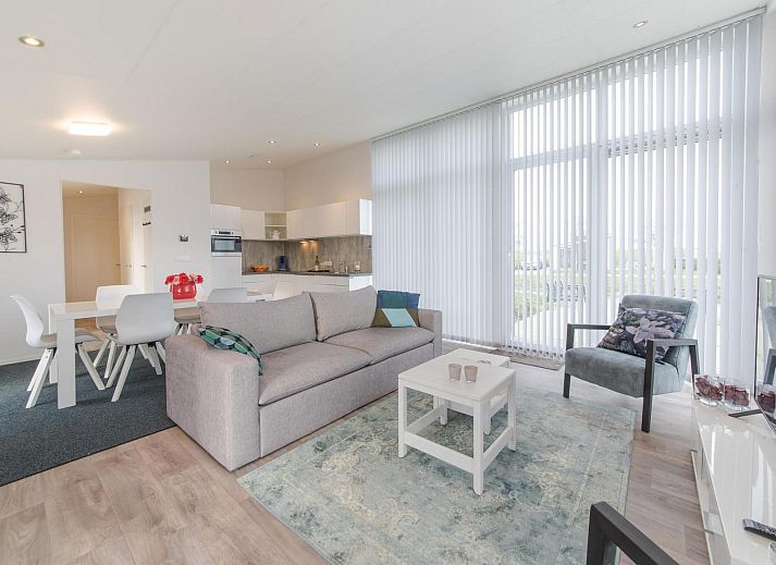 Vacation home Waterresort Oosterschelde - house no. 38 in Wemeldinge with modern exterior and green garden.