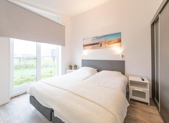 Terrace overlooking the water at Holiday home Waterresort Oosterschelde - house no. 38 in Wemeldinge, Zeeland.