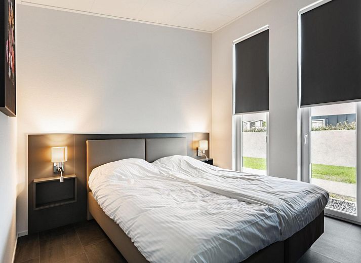 Stijlvolle woonkamer in Vakantiehuis Waterresort Oosterschelde - huisnr. 70, Wemeldinge, Zeeland.