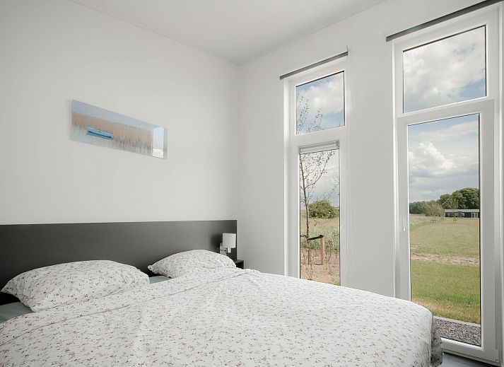 Ferienhaus Ruisweg 69 in Wemeldinge mit moderner Architektur und gruener Umgebung.