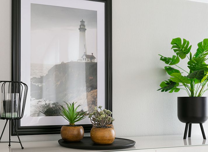 Essecke im Ferienhaus Ruisweg 56 mit Blick auf den Garten in Wemeldinge, Zeeland.