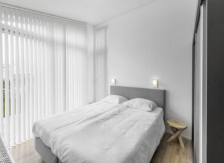 Terrasse des Ferienhauses Waterresort Oosterschelde Haus Nr. 55 in Wemeldinge, Zuid-Beveland, mit Blick auf die Natur.