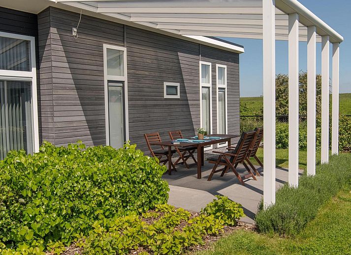 Innenbereich des Ferienhauses Waterresort Oosterschelde Haus Nr. 69 in Wemeldinge, mit moderner Einrichtung und viel natuerlichem Licht.