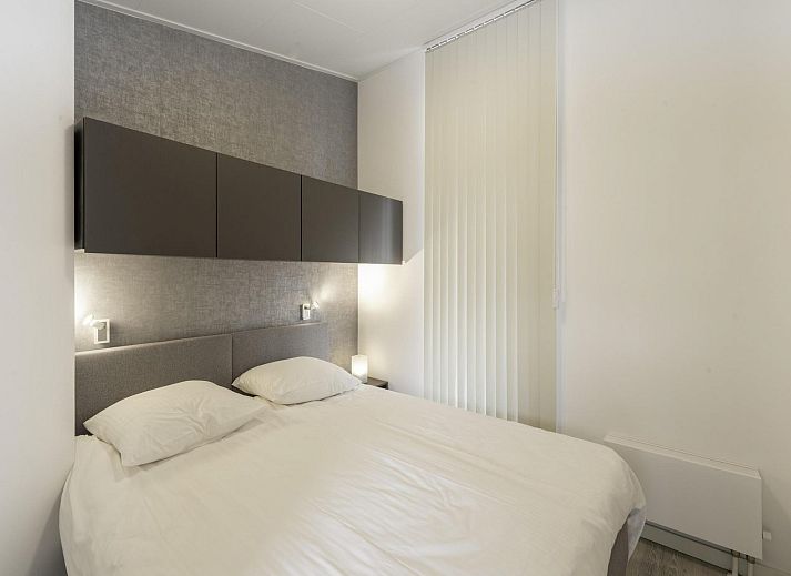 Gemuetliches Wohnzimmer des Ferienhauses Waterresort Oosterschelde Haus Nr. 71 in Wemeldinge, mit viel Tageslicht.