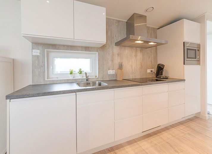 Terras van Vakantiehuis Waterresort Oosterschelde huisnr. 39 in Wemeldinge met comfortabele zitgelegenheid.