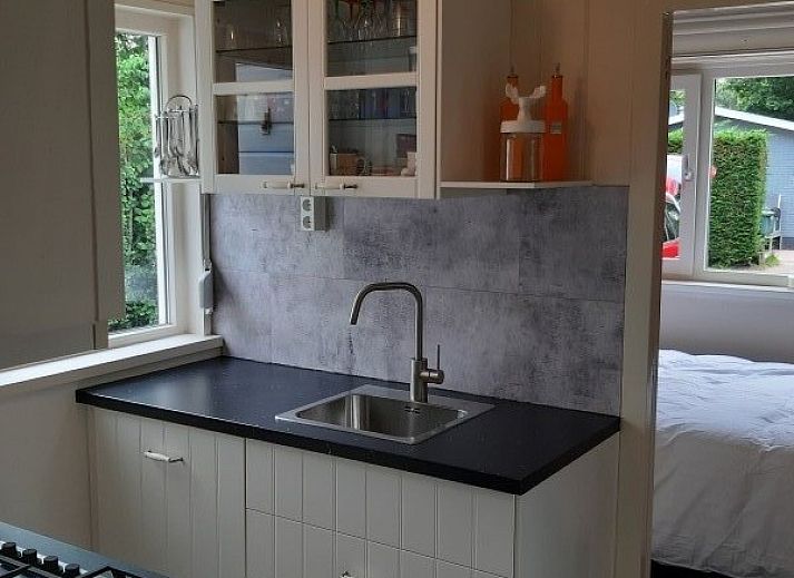 Gemtliches Wohnzimmer im Ferienhaus Scheldeoord, Baarland, Zuid-Beveland. Gemtlicher Innenraum mit viel Licht und modernen Mbeln.