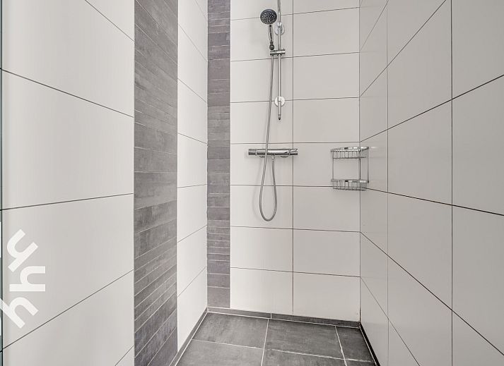 Spacious bedroom with multiple beds in vacation home ZE250 in Goes, Zeeland.