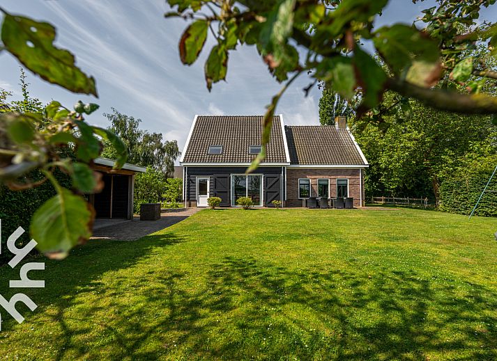 Spacious bedroom with multiple beds in vacation home ZE250 in Goes, Zeeland.