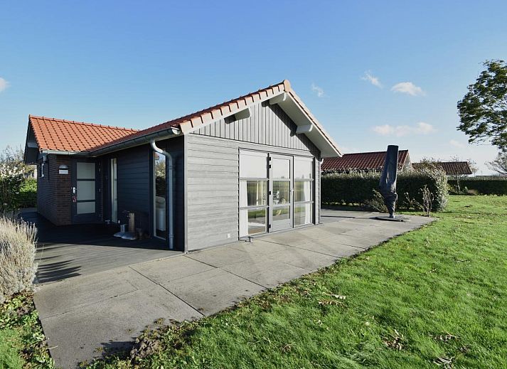 Gemuetliches Esszimmer im Ferienhaus Sun and Sea, Kattendijke, ideal fuer Familienessen.