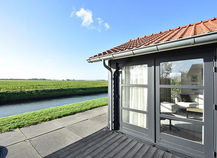 Gemuetliches Esszimmer im Ferienhaus Sun and Sea, Kattendijke, ideal fuer Familienessen.