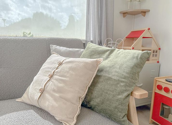 Vakantiehuis Timmerman in Heinkenszand, Zuid-Beveland, met ruime veranda en groene tuin omgeven door natuur.