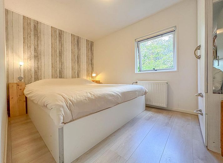 Veranda van vakantiehuis Timmerman in Heinkenszand, Zuid-Beveland. Geniet van de comfortabele buitenruimte en het uitzicht op de natuur.