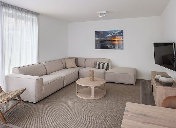 Familievilla 16 in Wolphaartsdijk, Zuid-Beveland, een ruim vakantiehuis met terras en groene omgeving in Zeeland.